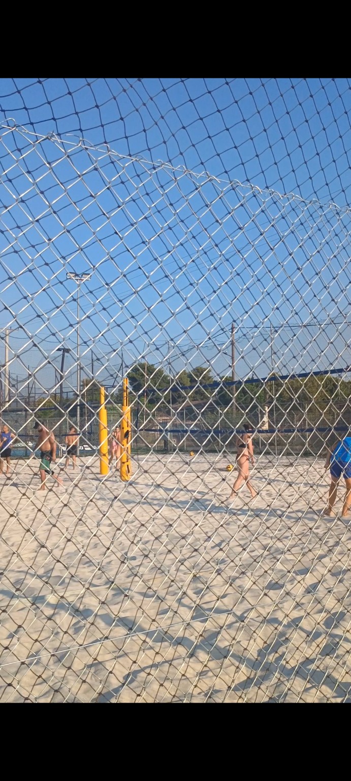 Tournament match at the River West courts