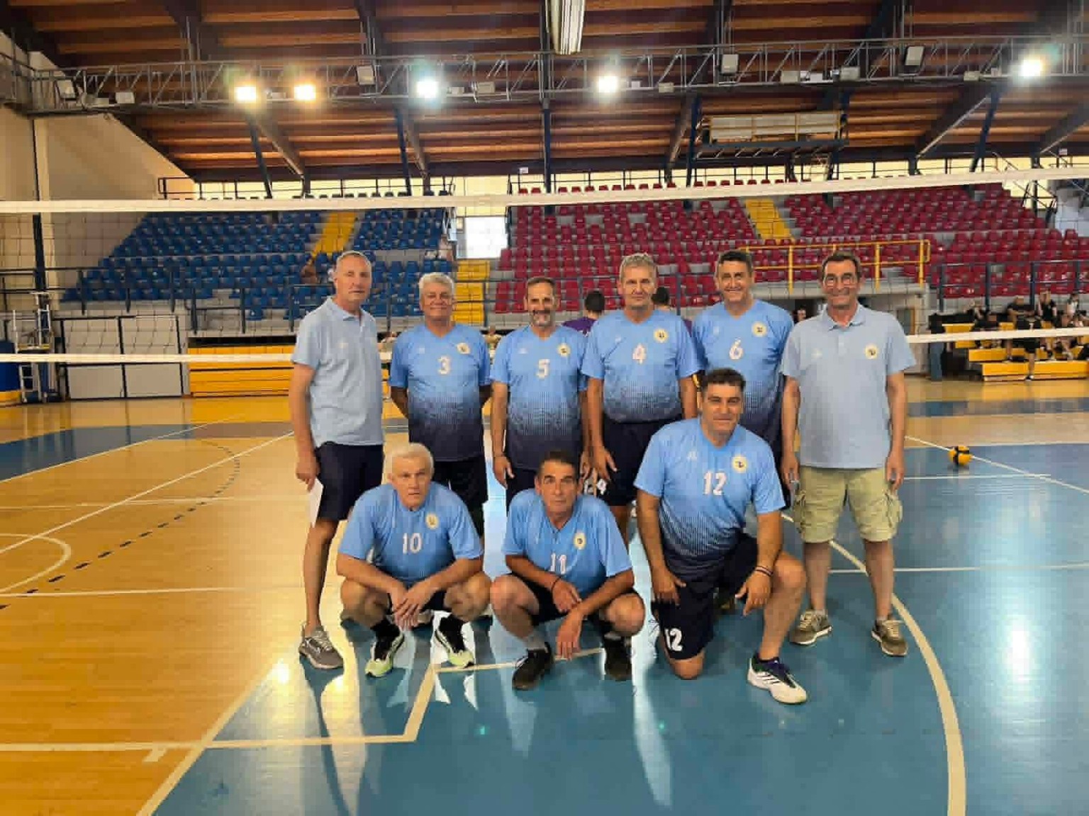 A participating team posing together on the court